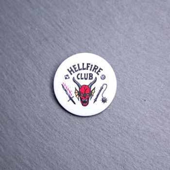Hellfire Button. These buttons are made with photo paper, metal round, and metal backing. These buttons are vibrant and fun to use on bags or vests.