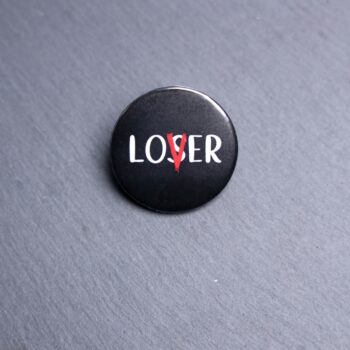 Loser Lover Button. These buttons are made with photo paper, metal round, and metal backing. These buttons are vibrant and fun to use on bags or vests.