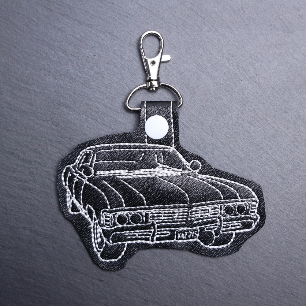 Supernatural Impala Snap Bag Tag. This bag tag is made with faux vinyl and embroidered. Comes with lobster clasp topper that easily hooks to a bag, zippers