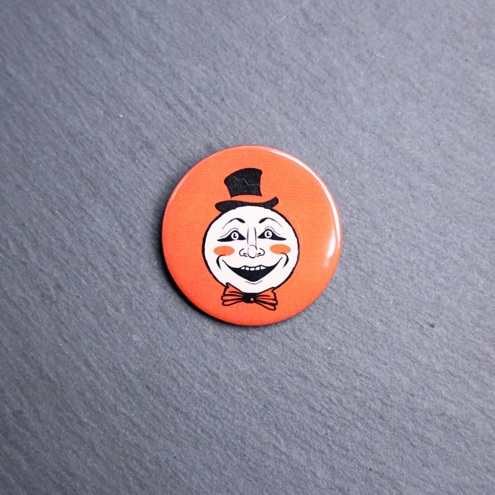 Vintage Moon Button. These buttons are made with photo paper, metal round, and metal backing. These buttons are vibrant and fun to use on bags or vests.