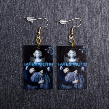 Bates Motel Poster Earrings. These earrings are made with acrylic and hand heat pressed. Comes with 18k plated gold hooks that is nickel free.