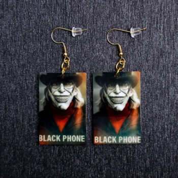 Black Phone Poster Earrings. These earrings are made with acrylic and hand heat pressed. Comes with 18k plated gold hooks that is nickel free. Slightly distressed and reflects in light.