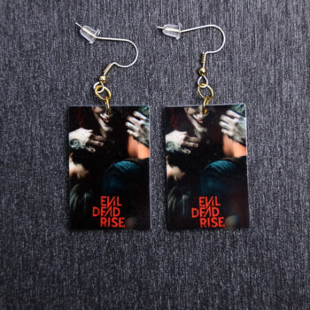 Evil Dead Rise Poster Earrings. These earrings are made with acrylic and hand heat pressed. Comes with 18k plated gold hooks that is nickel free.