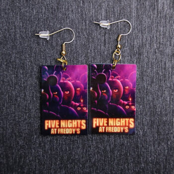 Five Nights At Freddy's Poster Earrings. These earrings are made with acrylic and hand heat pressed. Comes with 18k plated gold hooks that is nickel free.