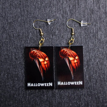 Halloween 1978 Poster Earrings. These earrings are made with acrylic and hand heat pressed. Comes with 18k plated gold hooks that is nickel free.