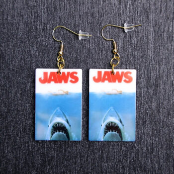 Jaws Poster Earrings. These earrings are made with acrylic and hand heat pressed. Comes with 18k plated gold hooks that is nickel free.