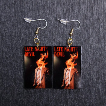 Late Night With The Devil Poster Earrings. These earrings are made with acrylic and hand heat pressed. Comes with 18k plated gold hooks that is nickel free.