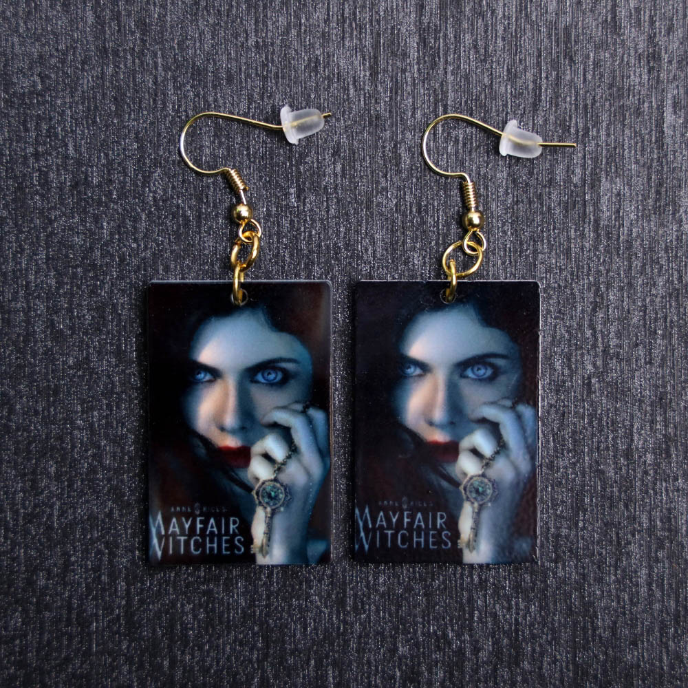 Mayfair Witches Poster Earrings. These earrings are made with acrylic and hand heat pressed. Comes with 18k plated gold hooks that is nickel free.