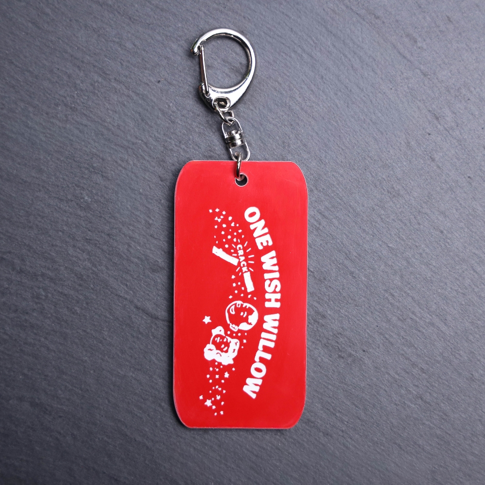 One Wish Willow Bag Tag. This bag tag is made with engraved acrylic. Comes with lobster clasp topper that easily hooks to a bag, zippers, keychains, and lanyards for fun display and swivels. White backside.