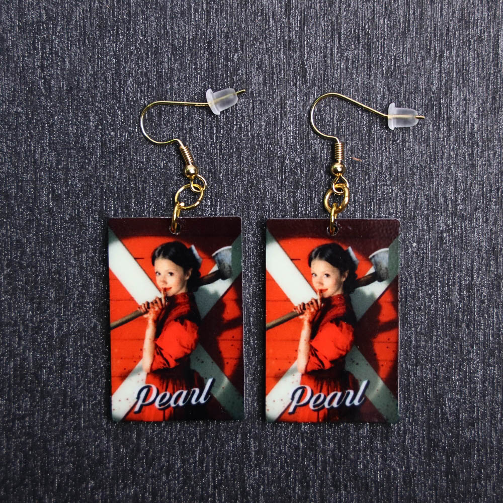 Pearl Poster Earrings. These earrings are made with acrylic and hand heat pressed. Comes with 18k plated gold hooks that is nickel free.