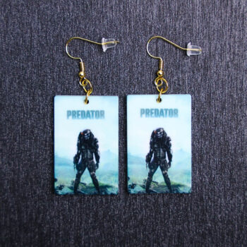 Predator Poster Earrings. These earrings are made with acrylic and hand heat pressed. Comes with 18k plated gold hooks that is nickel free.