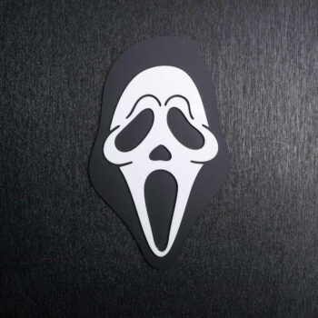 Ghostface White Sign. This sign is made with black matte acrylic base and a white acrylic topper. Comes with attachable keyhole.