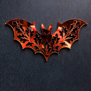 Fall Bat Orange Mirror Sign. This sign is made with black acrylic base and a orange mirror top layer. Comes with attachable keyhole.