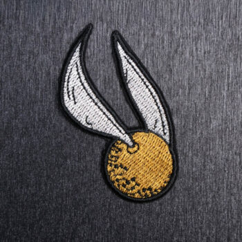 Golden Snitch Patch Sew On in white, yellow gold, and black. Beautifully embroidered design which is sew on design. Just sew or glue with E6000 glue onto your favorite bag, vest, or clothing.