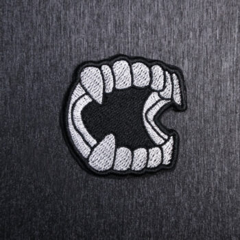Vampire Teeth Patch Sew On in white and black. Beautifully embroidered design which is sew on design. Just sew or glue with E6000 glue onto your favorite bag, vest, or clothing.